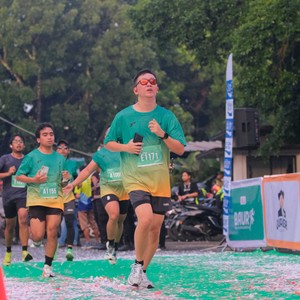 Race photo from BAUR RUN 2025
