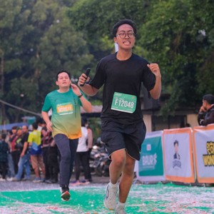 Race photo from BAUR RUN 2025