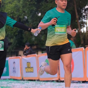 Race photo from BAUR RUN 2025