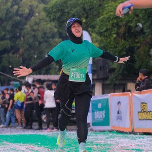 Race photo from BAUR RUN 2025