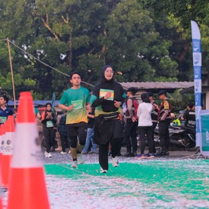 Race photo from BAUR RUN 2025