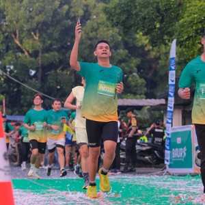 Race photo from BAUR RUN 2025