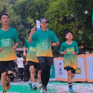 Race photo from BAUR RUN 2025
