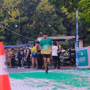 Race photo from BAUR RUN 2025