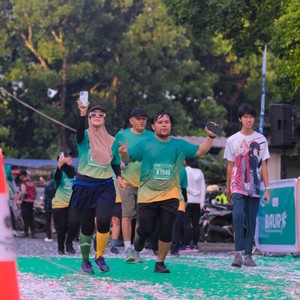 Race photo from BAUR RUN 2025