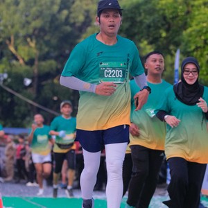 Race photo from BAUR RUN 2025
