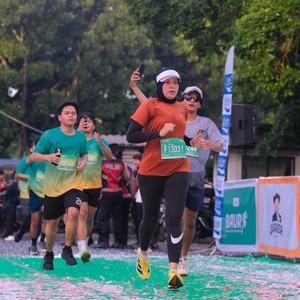 Race photo from BAUR RUN 2025