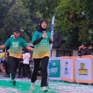 Race photo from BAUR RUN 2025