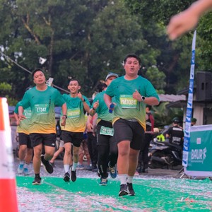 Race photo from BAUR RUN 2025