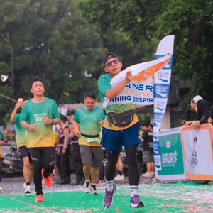 Race photo from BAUR RUN 2025
