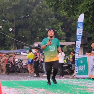 Race photo from BAUR RUN 2025