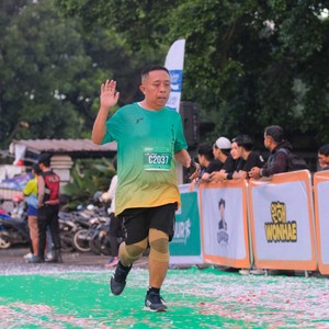 Race photo from BAUR RUN 2025