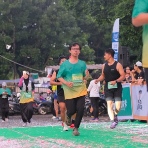 Race photo from BAUR RUN 2025