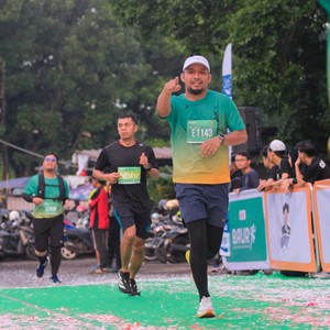 Race photo from BAUR RUN 2025