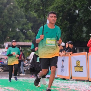 Race photo from BAUR RUN 2025