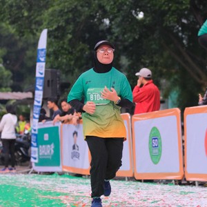 Race photo from BAUR RUN 2025