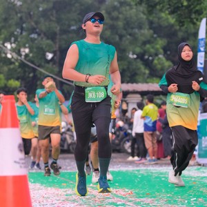 Race photo from BAUR RUN 2025