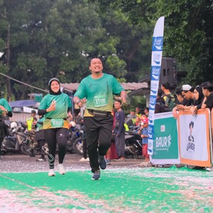Race photo from BAUR RUN 2025