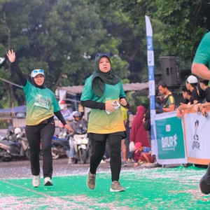 Race photo from BAUR RUN 2025