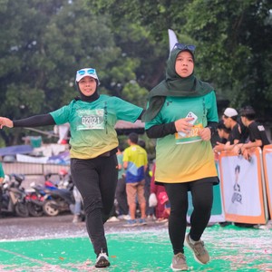 Race photo from BAUR RUN 2025