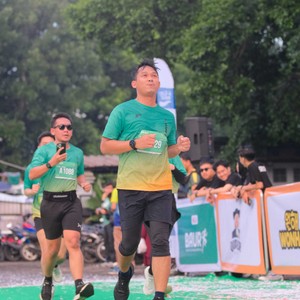 Race photo from BAUR RUN 2025