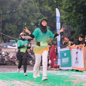 Race photo from BAUR RUN 2025