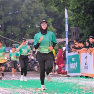Race photo from BAUR RUN 2025