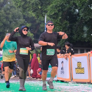 Race photo from BAUR RUN 2025