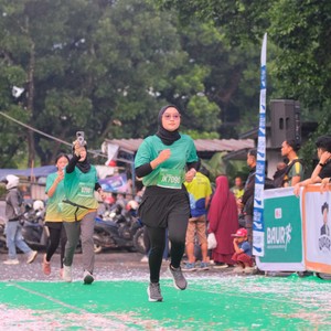 Race photo from BAUR RUN 2025