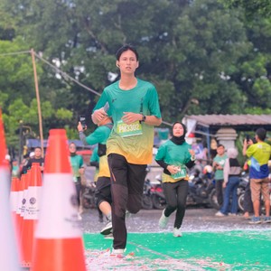 Race photo from BAUR RUN 2025