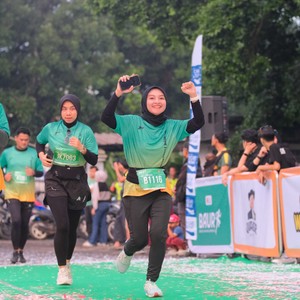 Race photo from BAUR RUN 2025