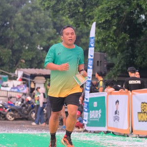 Race photo from BAUR RUN 2025
