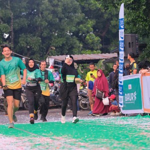 Race photo from BAUR RUN 2025