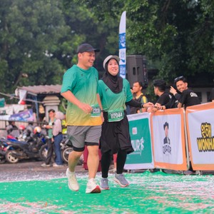 Race photo from BAUR RUN 2025