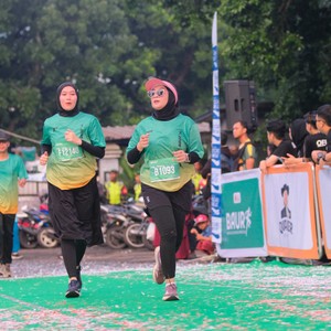 Race photo from BAUR RUN 2025