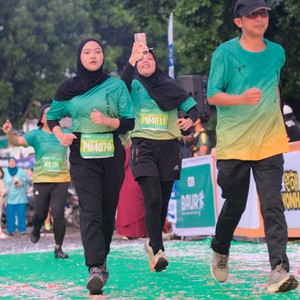 Race photo from BAUR RUN 2025