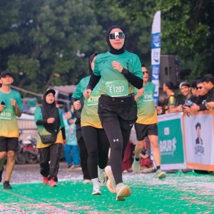 Race photo from BAUR RUN 2025