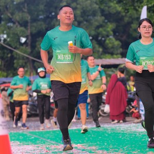 Race photo from BAUR RUN 2025