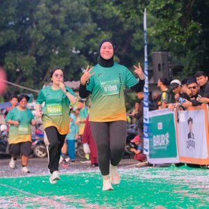 Race photo from BAUR RUN 2025