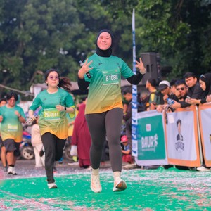 Race photo from BAUR RUN 2025