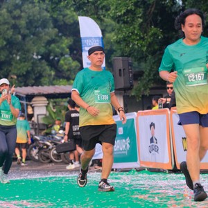 Race photo from BAUR RUN 2025