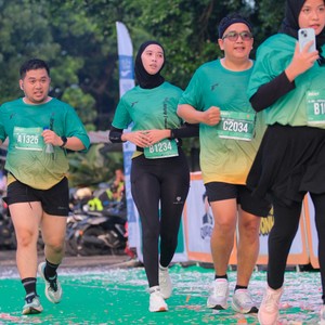 Race photo from BAUR RUN 2025