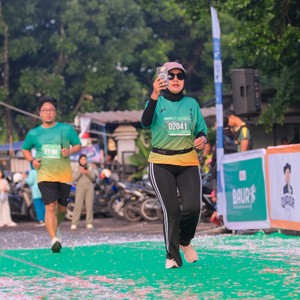 Race photo from BAUR RUN 2025