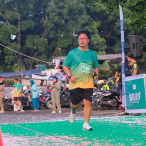 Race photo from BAUR RUN 2025