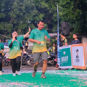 Race photo from BAUR RUN 2025