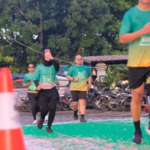 Race photo from BAUR RUN 2025