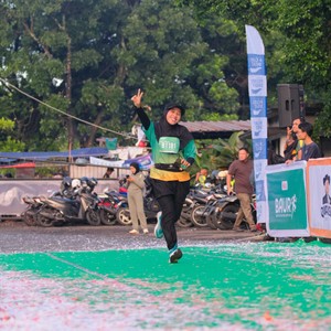 Race photo from BAUR RUN 2025