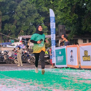 Race photo from BAUR RUN 2025