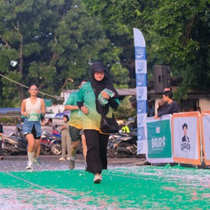 Race photo from BAUR RUN 2025