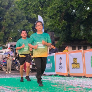 Race photo from BAUR RUN 2025